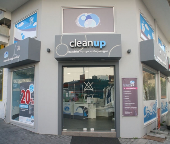 The exterior of a Clean Up laundry shop.