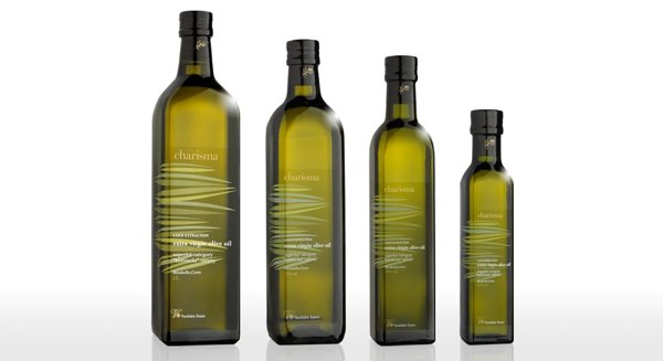 Charisma - Different size bottles of olive oil.