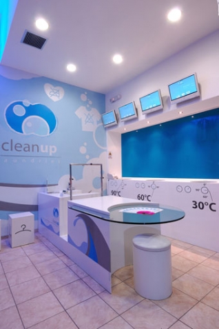 The interior of a Clean Up laundry shop.